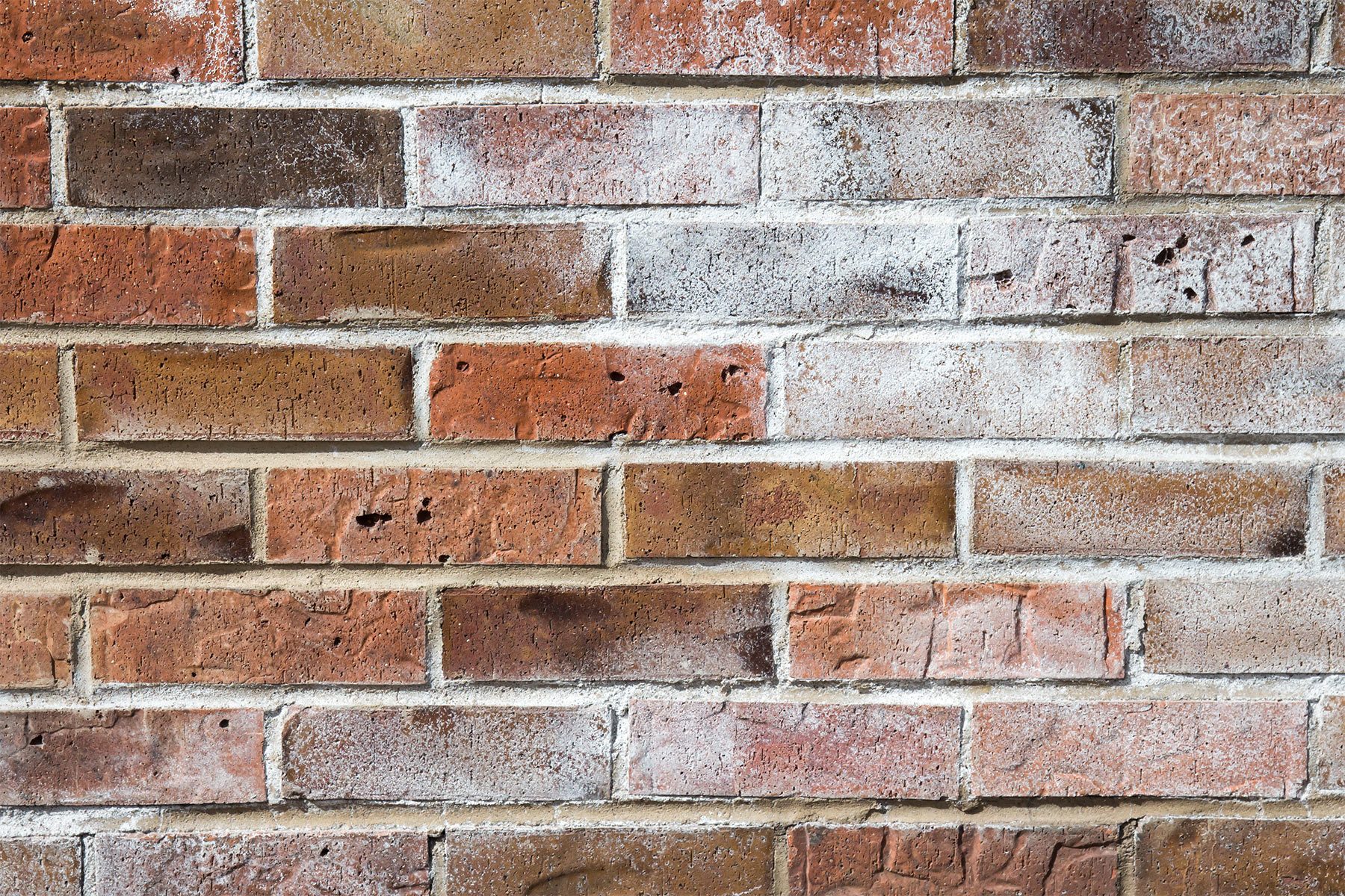 Silent Signs That Your House Has A Serious Problem Efflorescence on Chimney Brick on a red brick wall