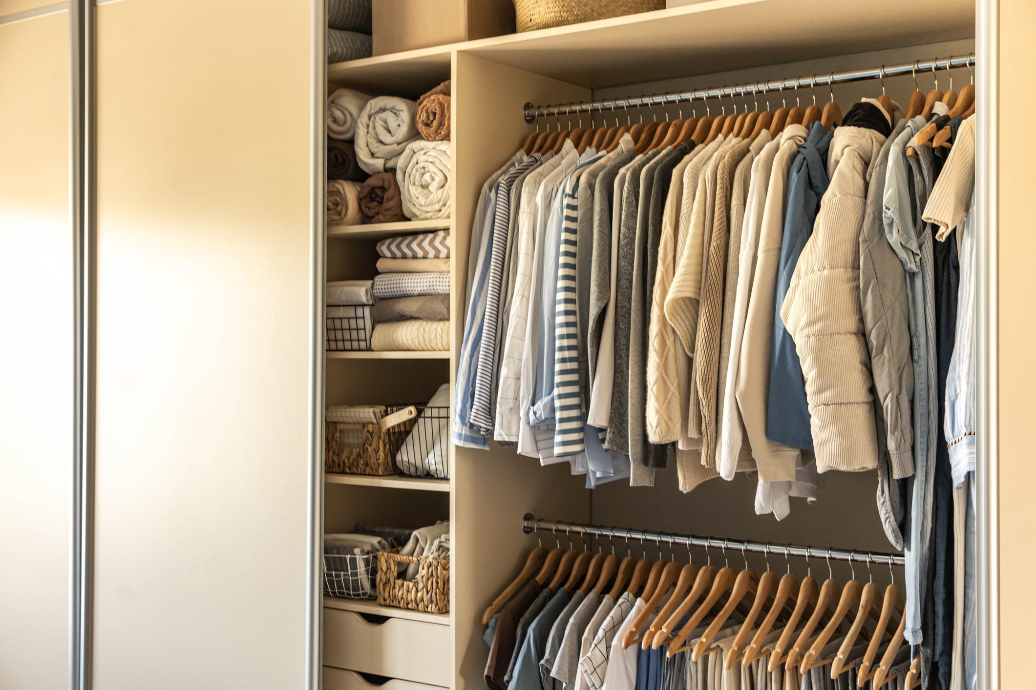 Large Wardrobe Closet With Different Clothes. The Concept Of Storage And Tidiness Order.