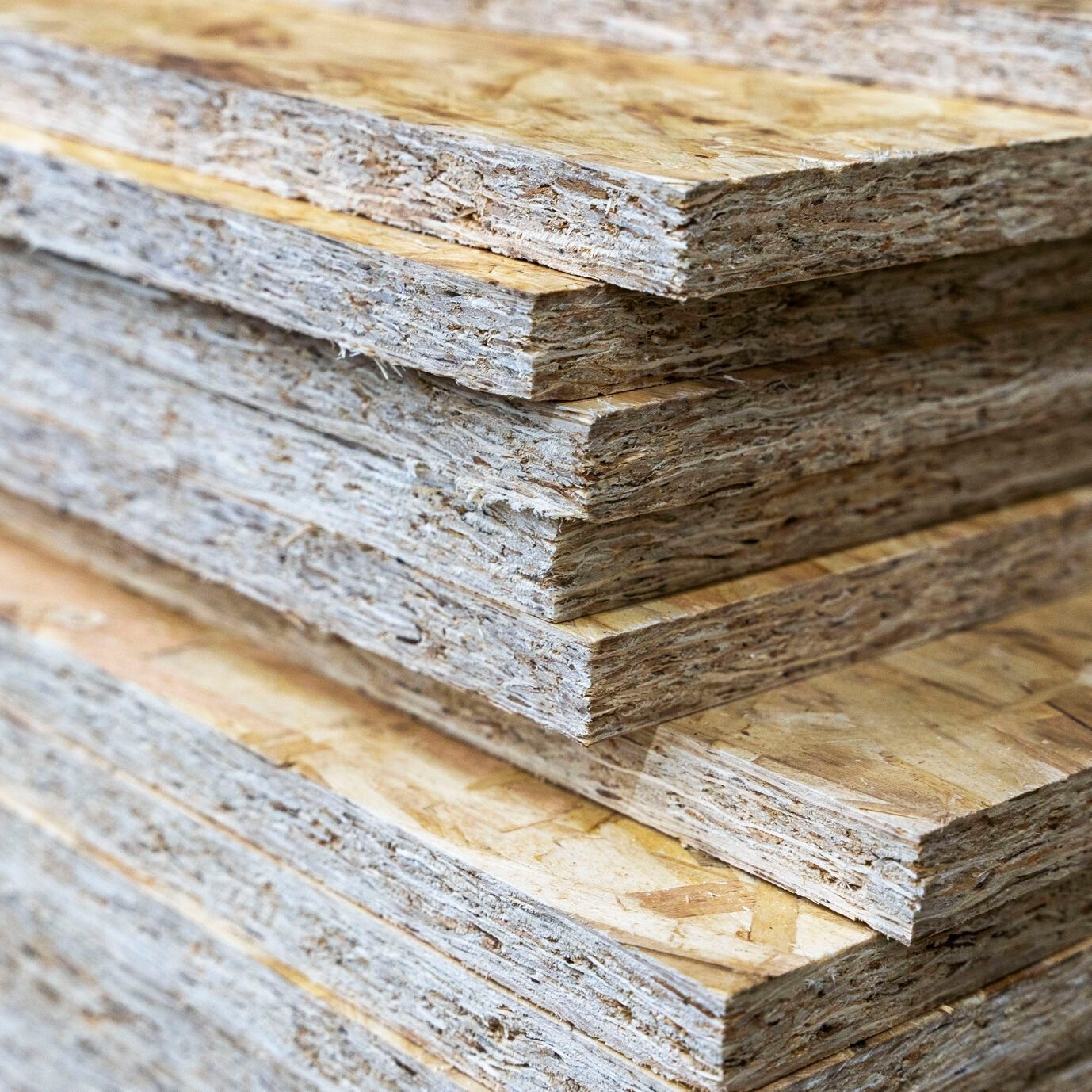 A stack of chipboard in a hardware store. Particle wood