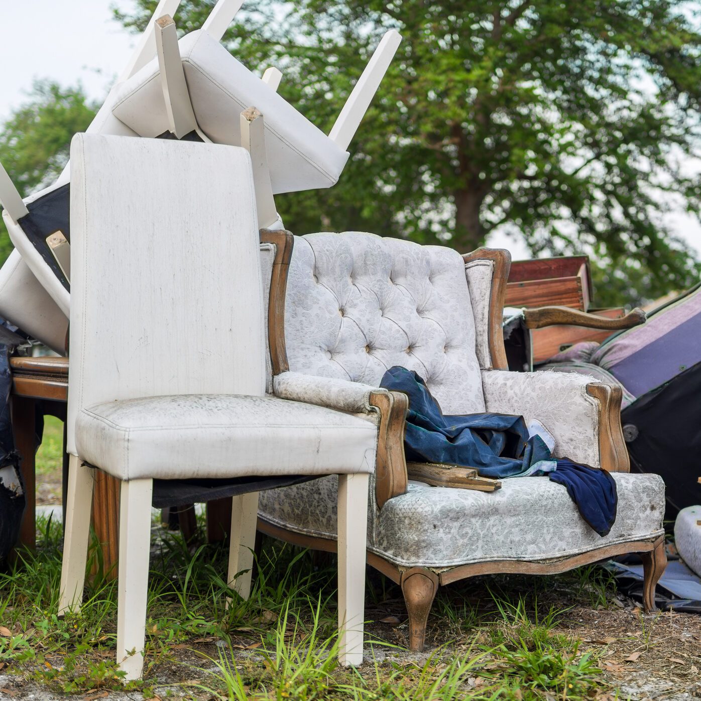 Pile of Abandoned Household Items on Curb