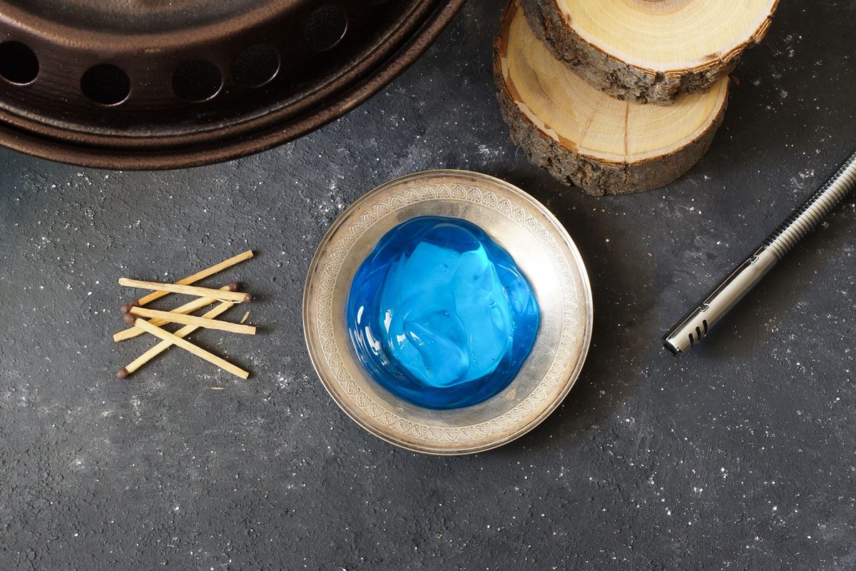 fuel gel in metal dish with matchsticks