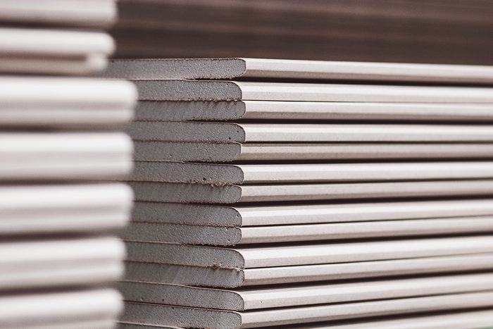 Wallboards Plasterboard Drywall Standard Gypsum Panels Stacked In Hardware Store Closeup