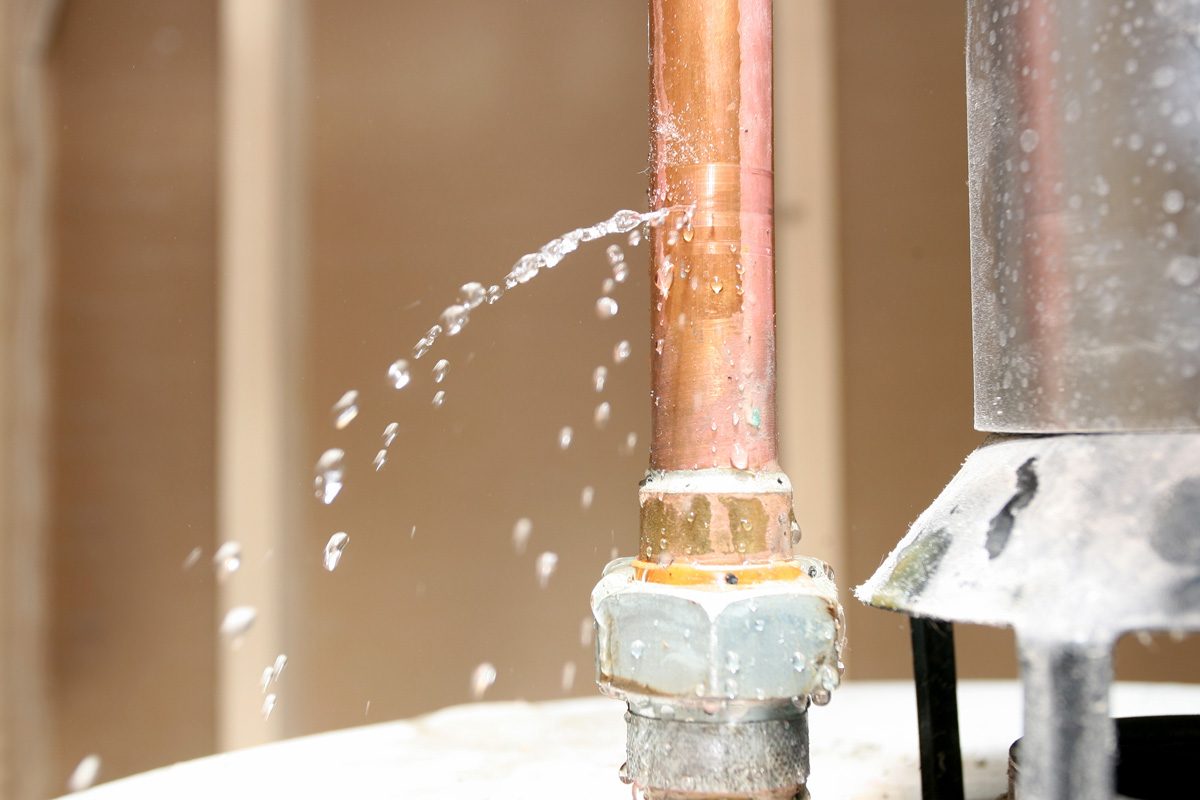 water leaking out of pipe on water heater