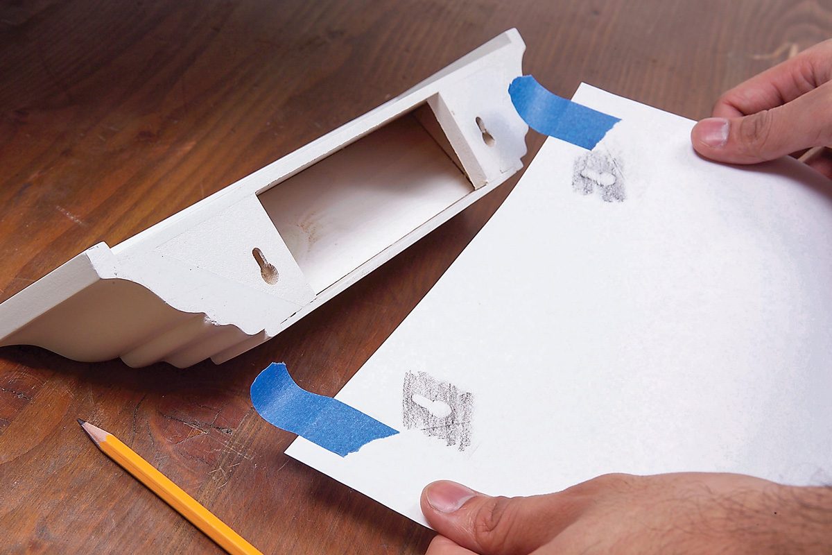 keyhole template to help position the wall screws