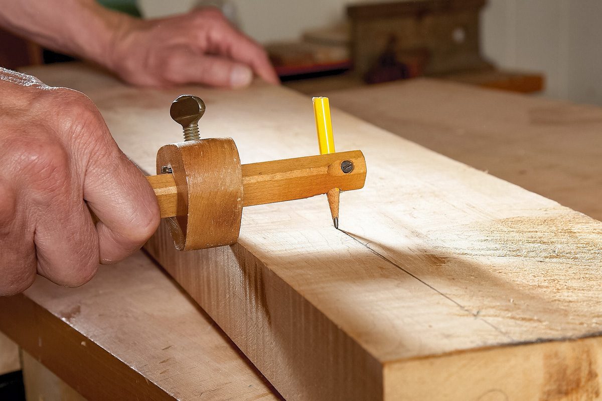 pencil stuck in marking gauge for tracing cutting lines