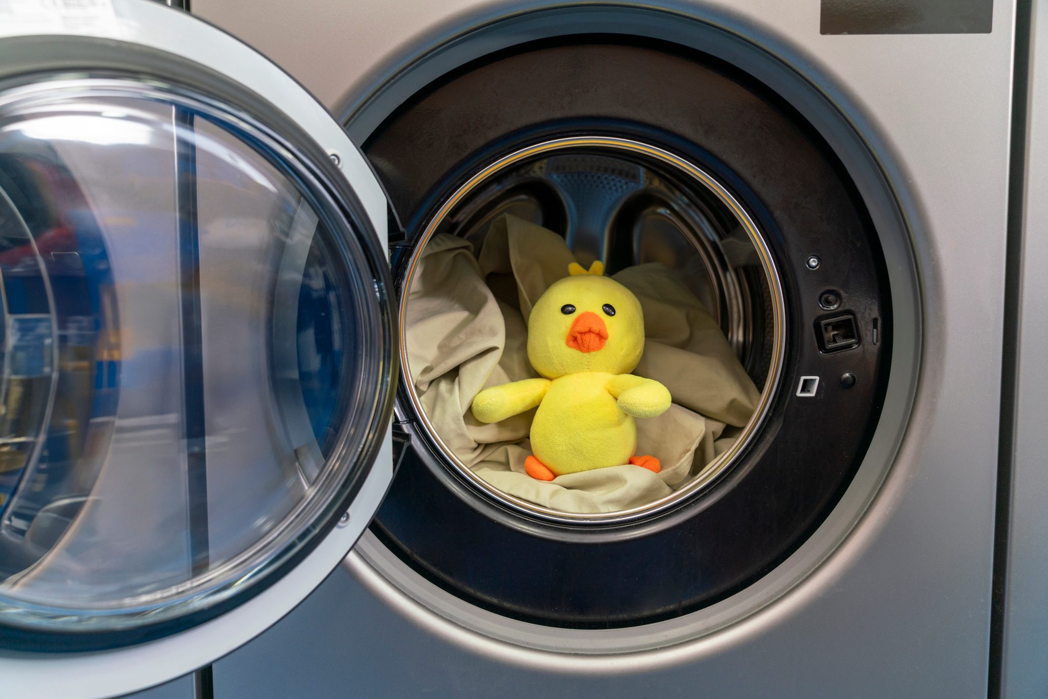 Yellow duck with sheet in dryer