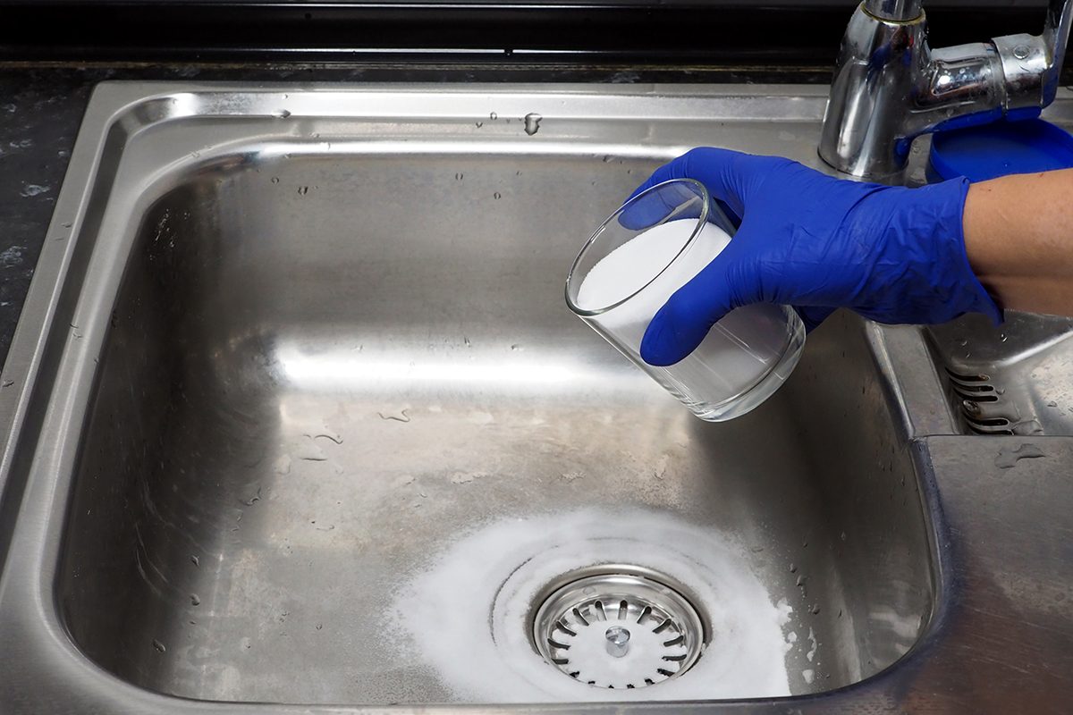 How To Clean Drain With Baking Soda And Vinegar Gettyimages 1443820310