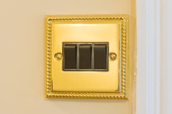 triple brass electrical light fitting
